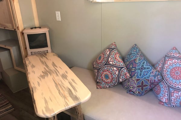 view of a couch in the gypsy caravan