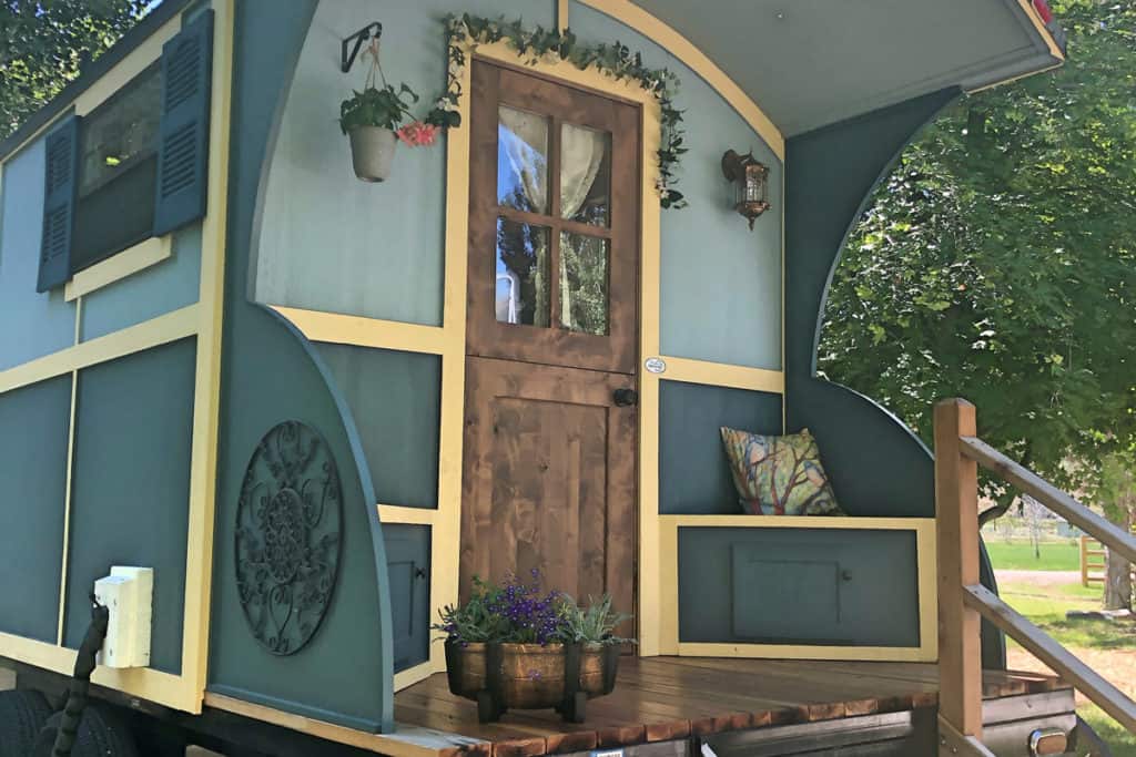 View of Glamping Caravan with door and small deck