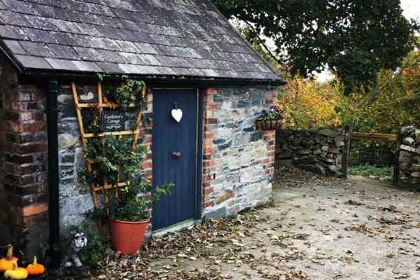 The Glamping Belfast Gardener's Cottage view of front