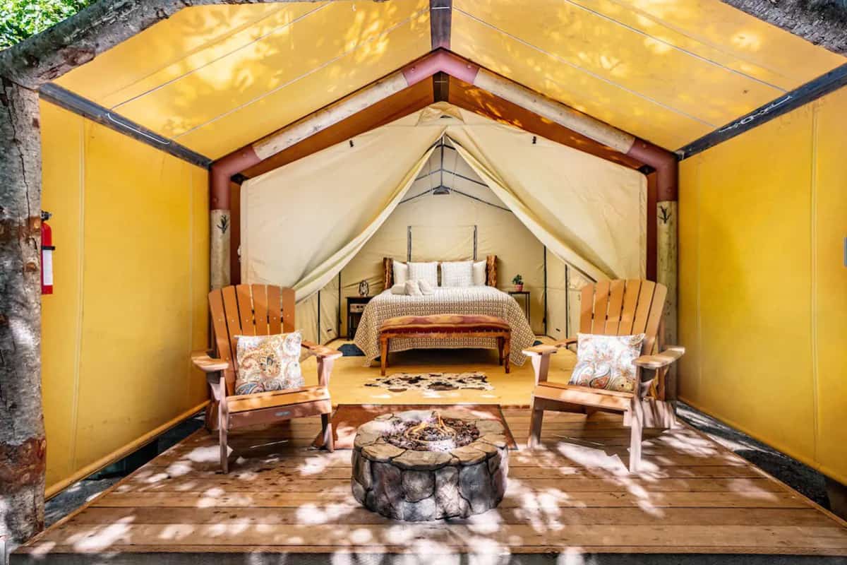 Glamping Big Sur California Glamping Tent view of inside with bed and chairs