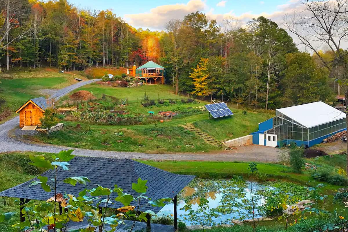 Best Yurts in North Carolina Pic of the Cozy Yurt Asheville view of the property with yurt, greenhouse, solar, pond and gardens