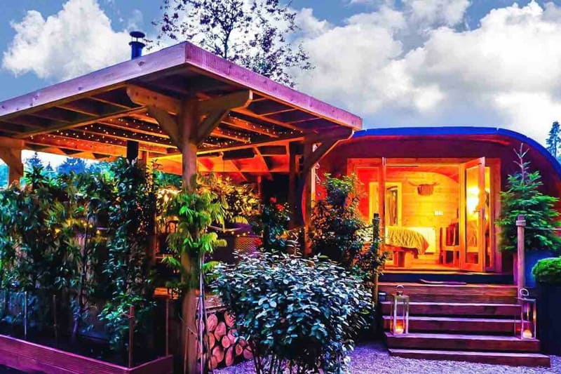 Loch Lomond Glamping view of the structure with doors open and stairs and a covered deck